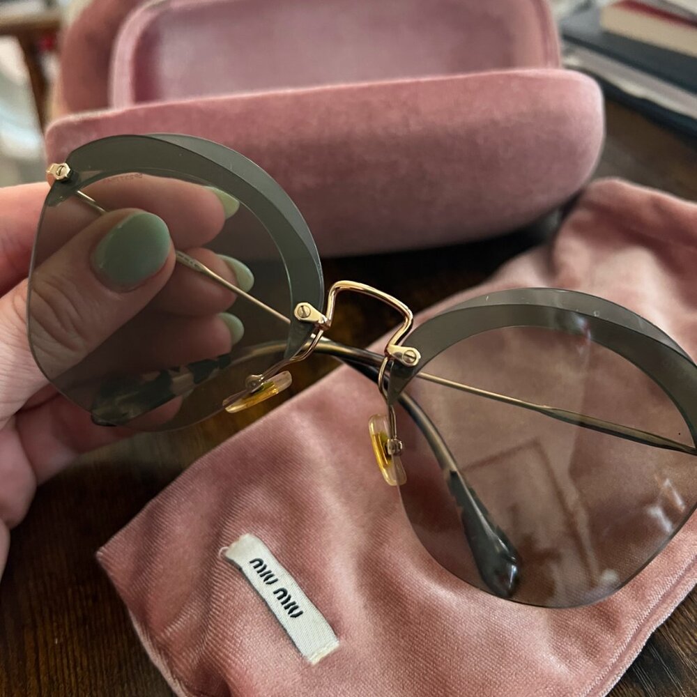 Miu Miu green sunglasses